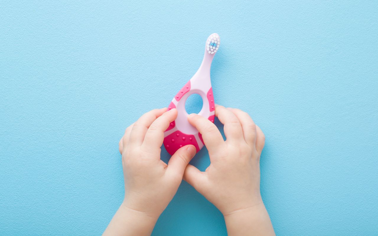 baby hands, baby toothbrush