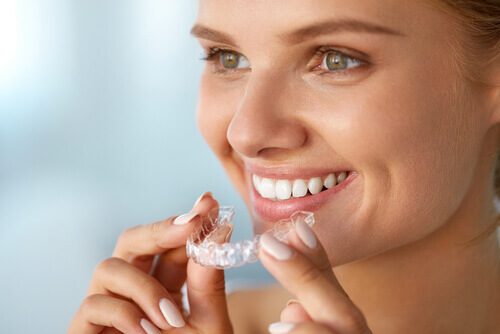 portrait of beautiful smiling woman with healthy straight white teeth