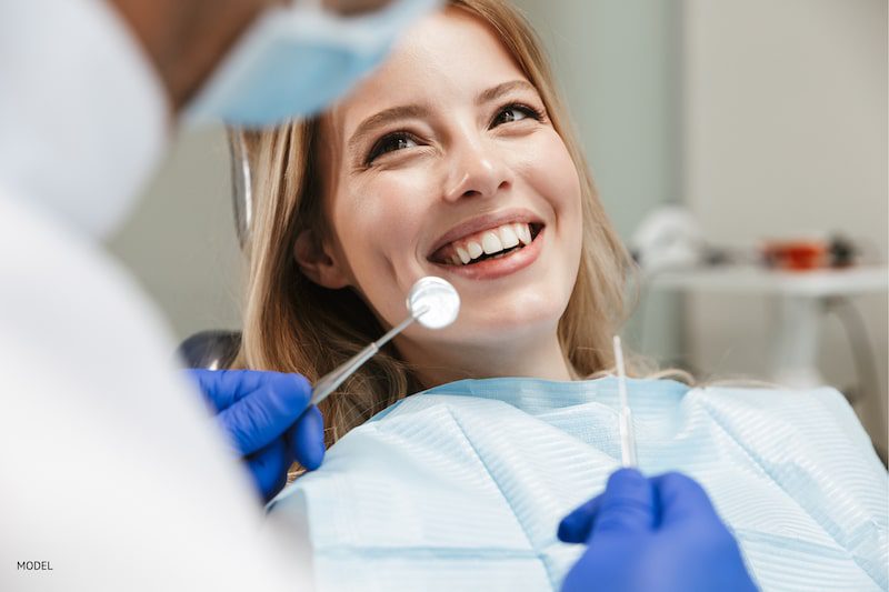 Woman happy and relaxed at her dentist appointment.