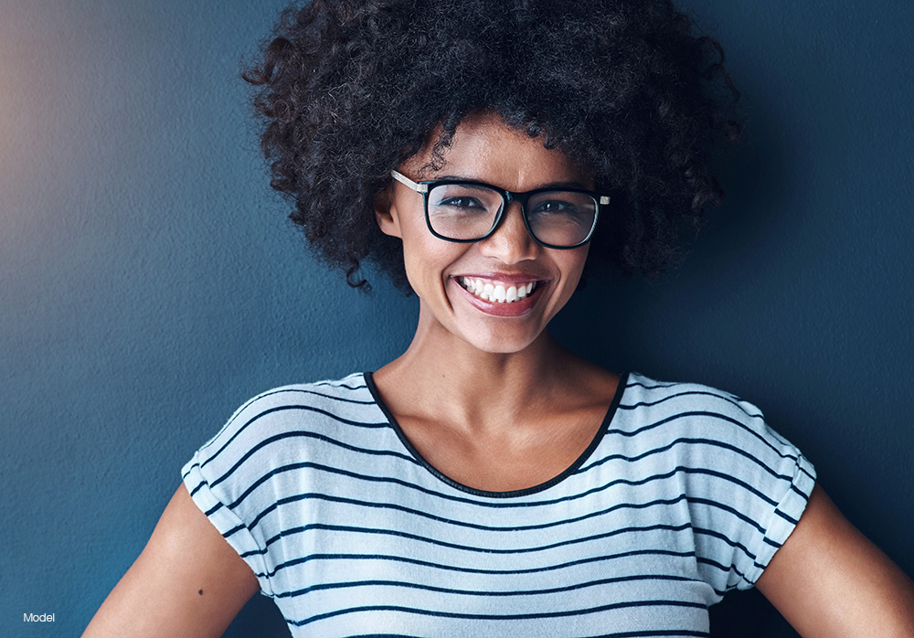Woman with curly hair smiling
