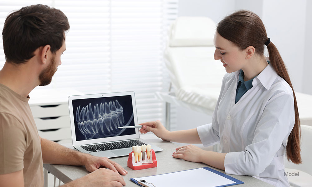 Doctor showing patient X-ray picture